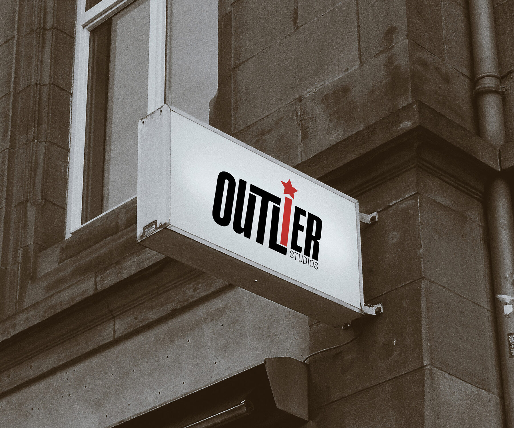 Outlier Studios brand mockup